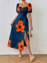 Vestido Floral Elegante com Manga Bufante e Fenda Lateral